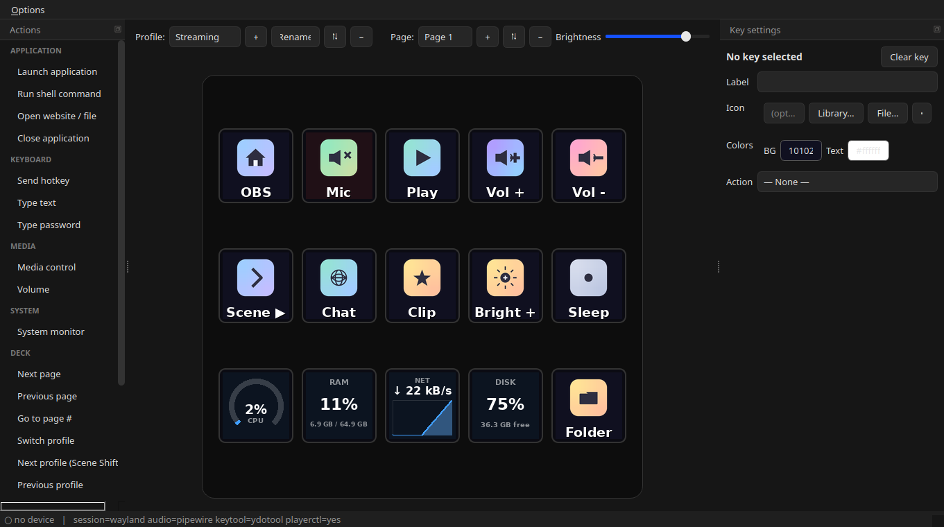 Configuration GUI: actions catalog, the live key grid with system-monitor keys (CPU gauge, RAM, network graph, disk), and the key-settings panel